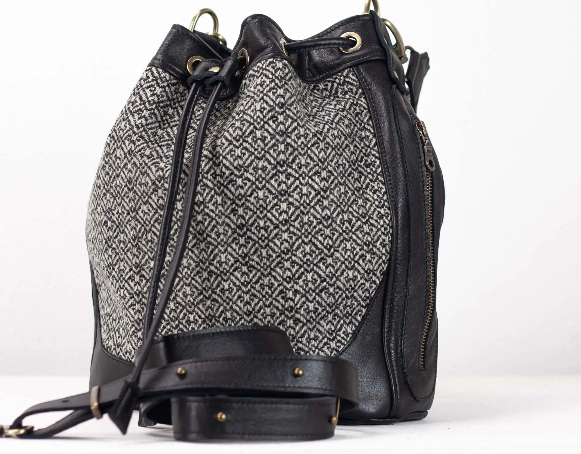Black and gray patterned drawstring bag on a white background