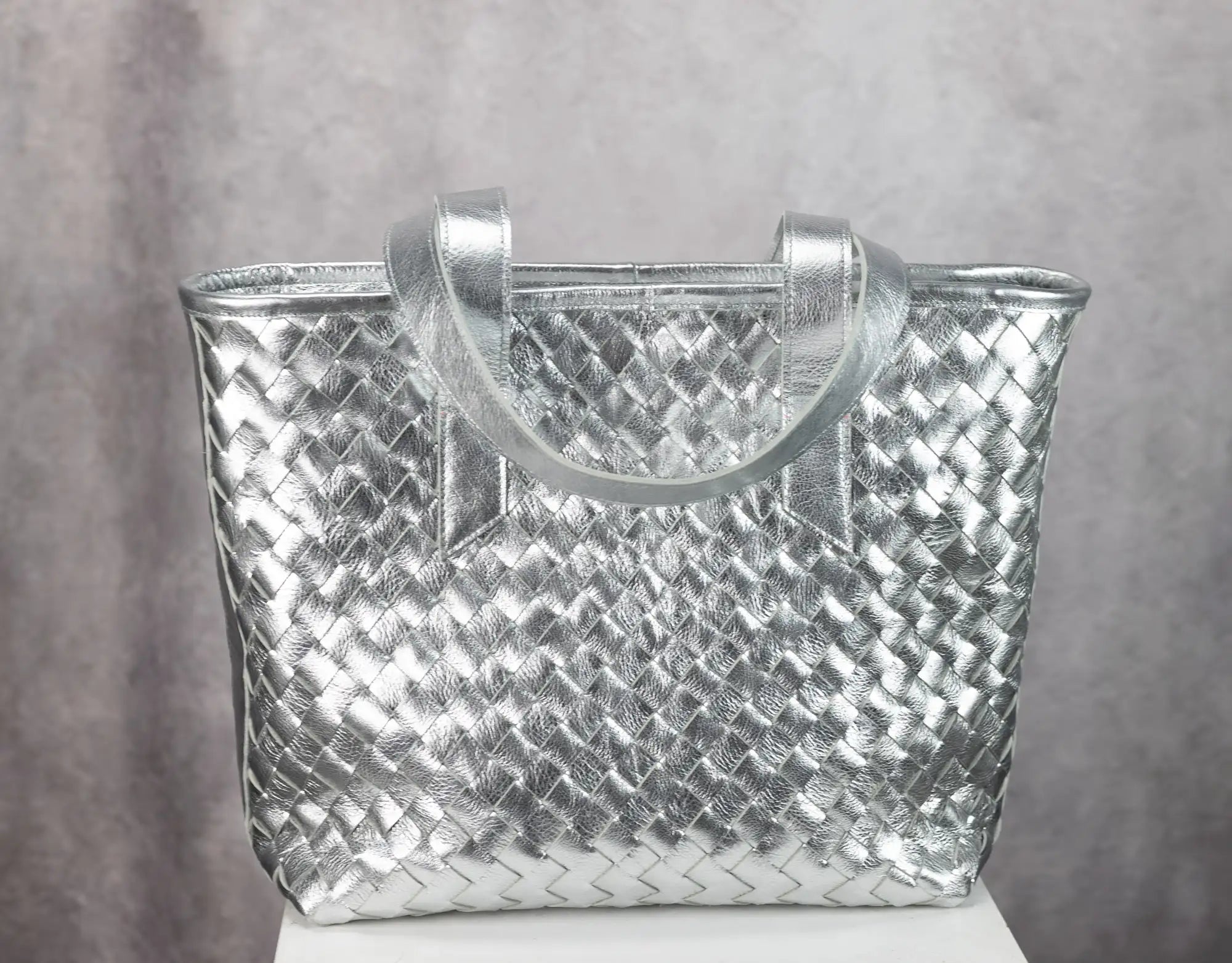 Silver woven handbag