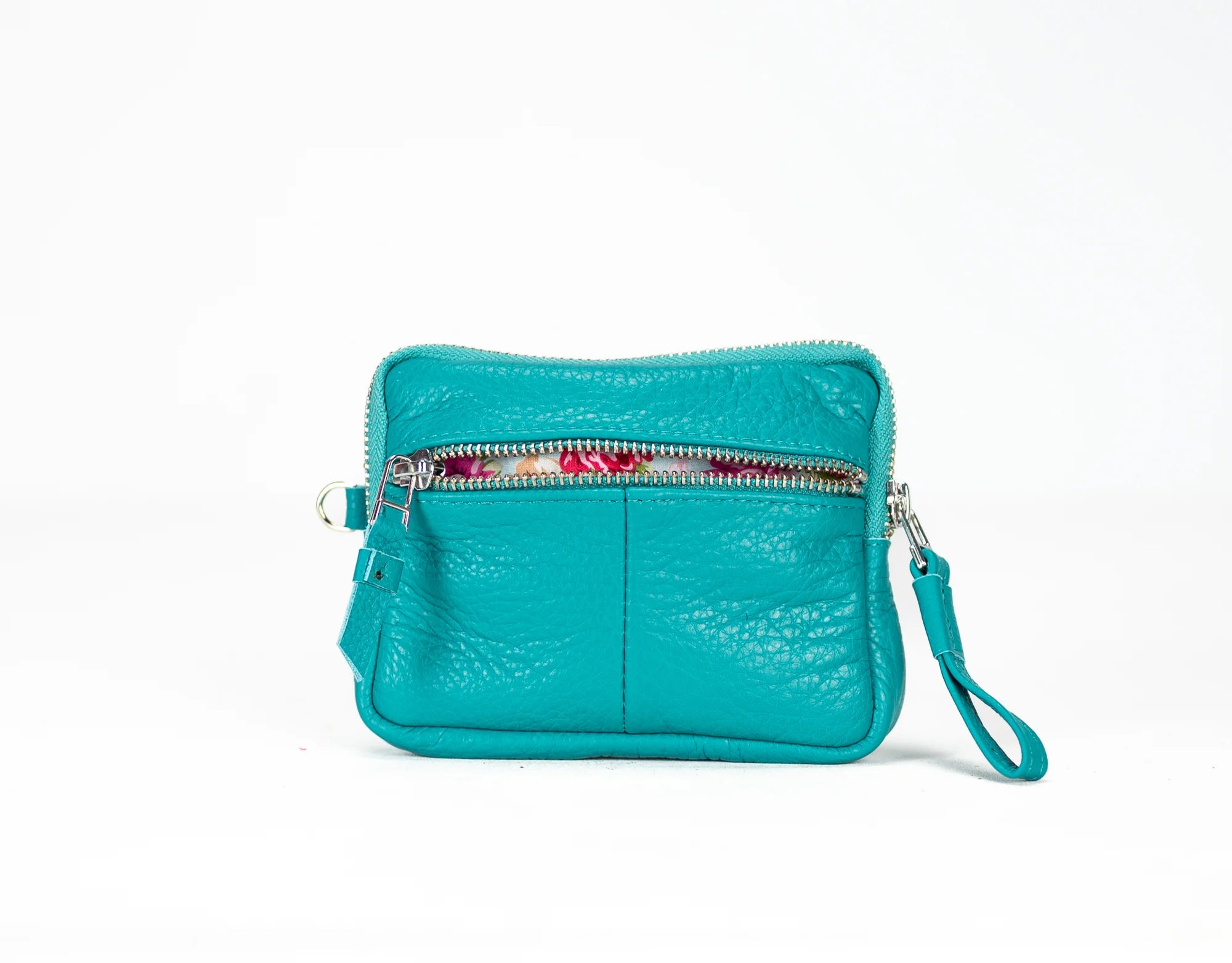 Turquoise leather clutch with a wrist strap on a white background