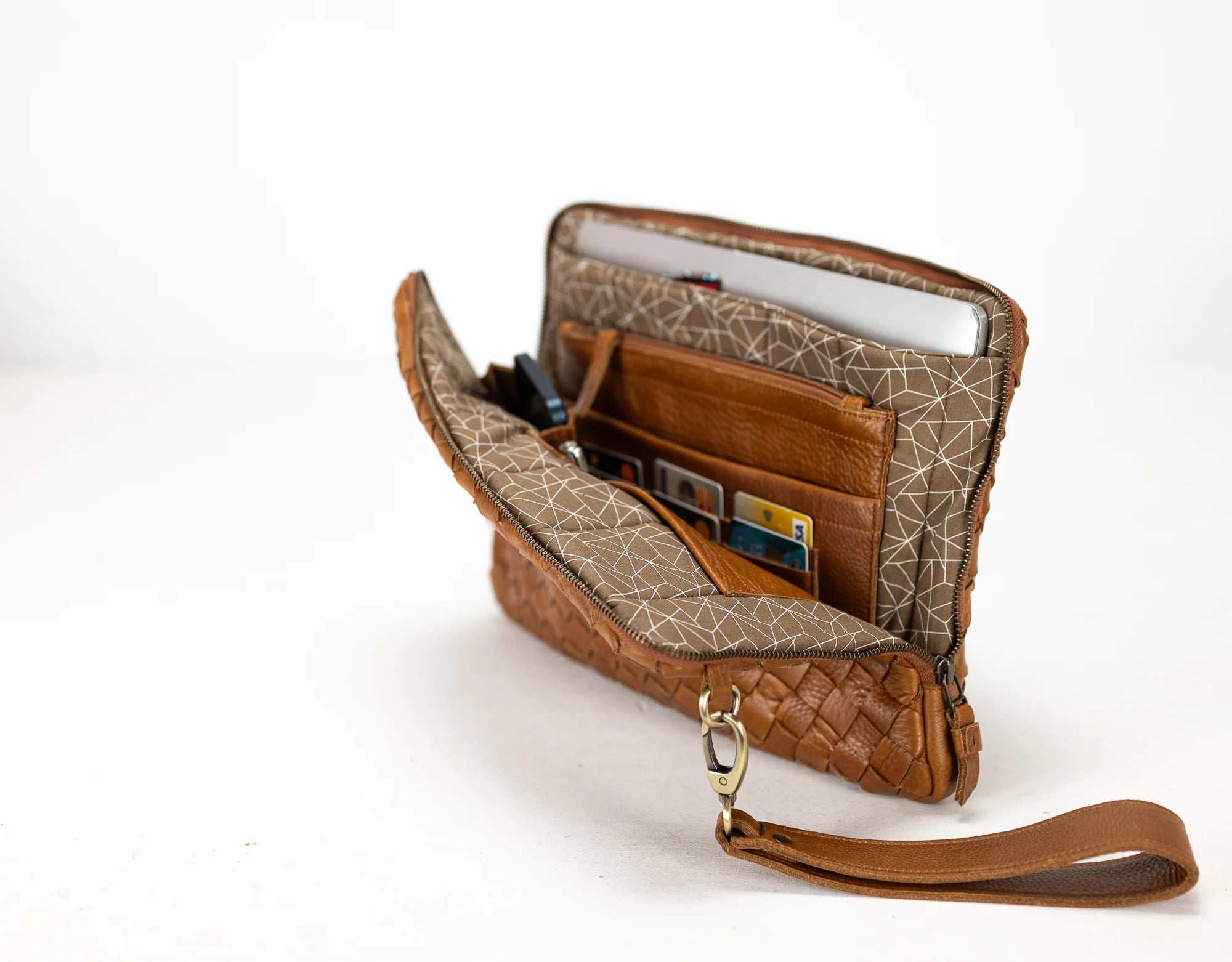 Brown leather wallet with geometric pattern on a white background