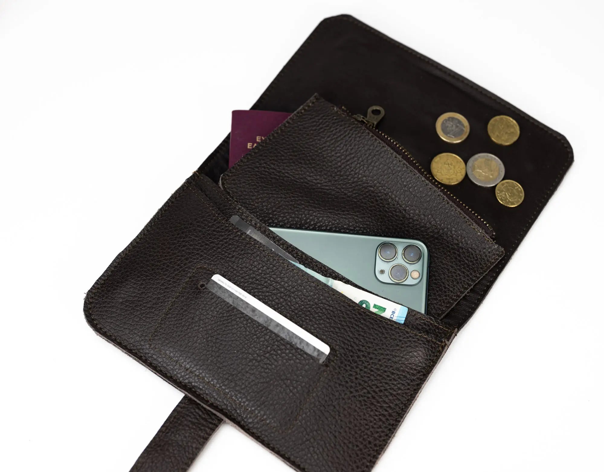 Brown leather wallet wallet with phone, coins, and cards on a white background