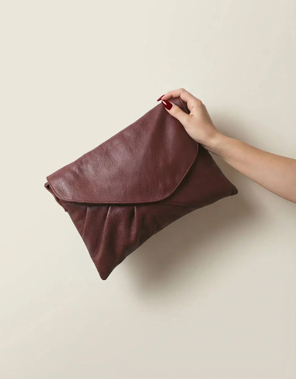 Leather clutches   by milloo, made in Greece