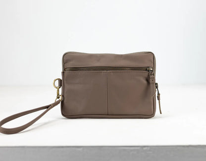 Brown leather crossbody bag on a white background
