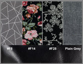 Fabric swatches with different patterns and textures on a plain background