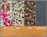 Fabric swatches with floral and patterned designs, labeled with color codes and names.