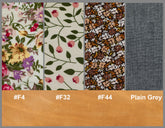 Fabric swatches with floral and patterned designs alongside plain gray fabric, with color codes below.