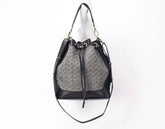 Black and gray patterned drawstring bag on a white background