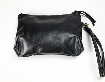 Black leather wristlet clutch with a zipper closure and wrist strap, photographed on a plain white background.