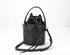 Black textured bucket bag on a white background