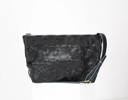 Black textured handbag on a white background