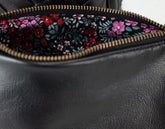 black leather clutch