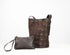 A dark brown leather shoulder bag with a distinctive raised geometric honeycomb pattern, shown next to a matching small leather wristlet pouch on a clean white background.