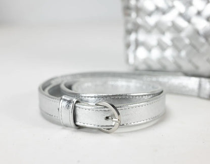 Silver belt on a light gray background