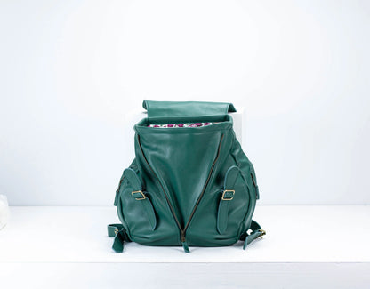 Green backpack on a white background