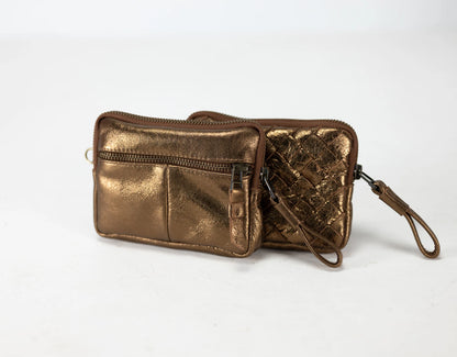 Bronze metallic wallet with a strap on a white background