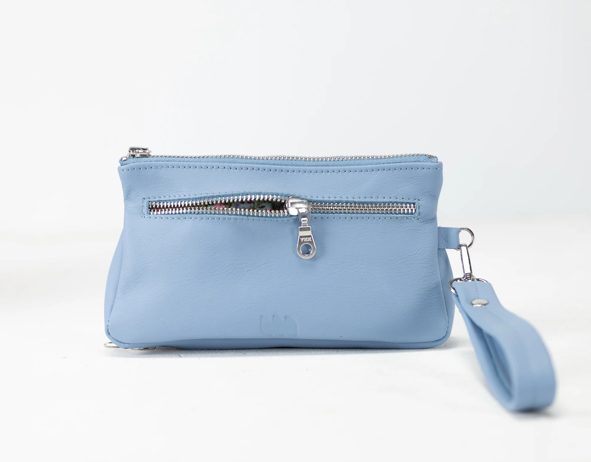 Light blue pouch with a zipper and wrist strap on a white background