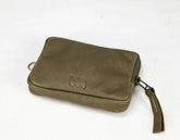 Green leather wallet with a brand logo on a white background