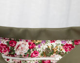 Floral-patterned belt bag with a plain background