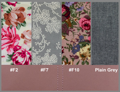 Fabric swatches with floral and plain patterns on a gray background