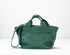 Green textured handbag on a white background