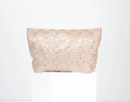 Beige woven clutch bag on a white background