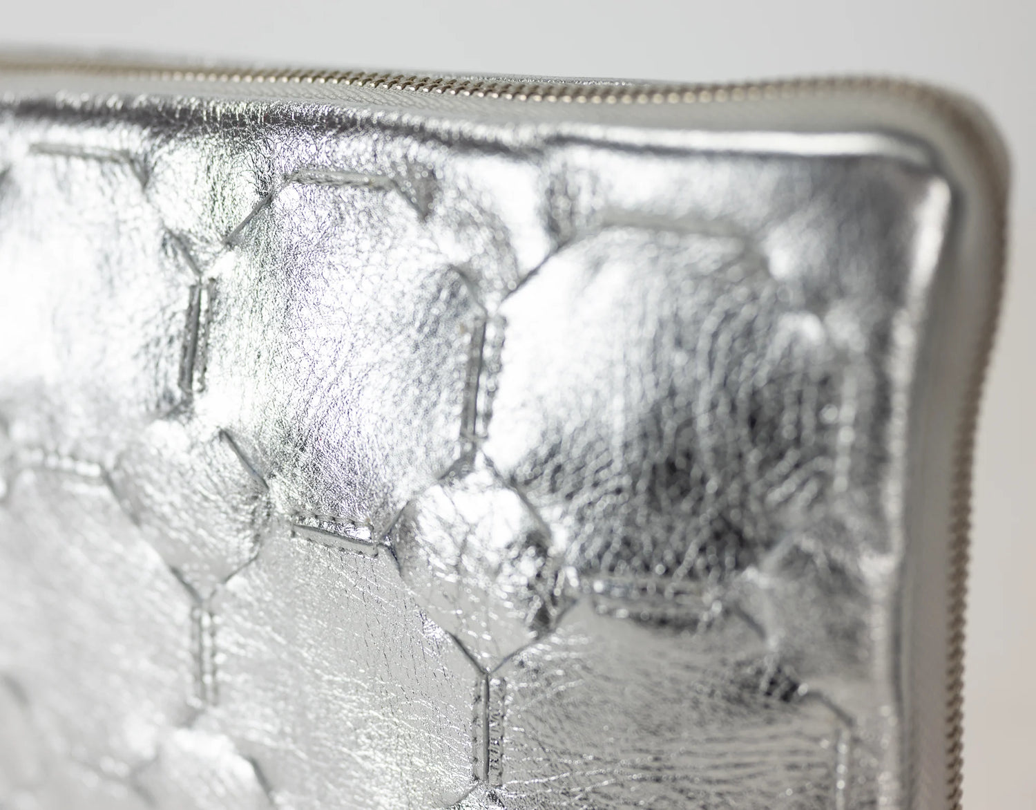 Close-up of a silver metal object with textured surface