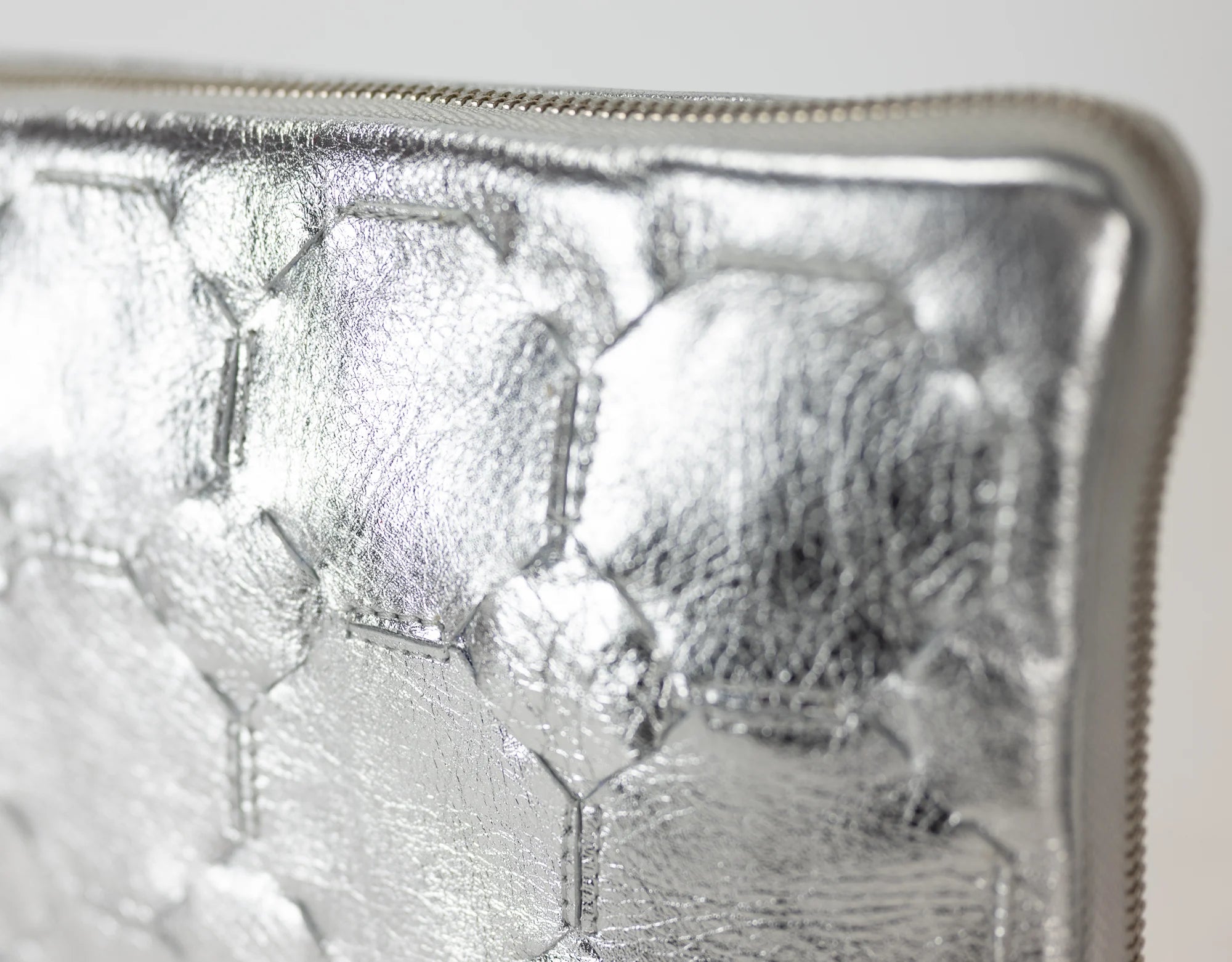 Close-up of a silver metal object with textured surface