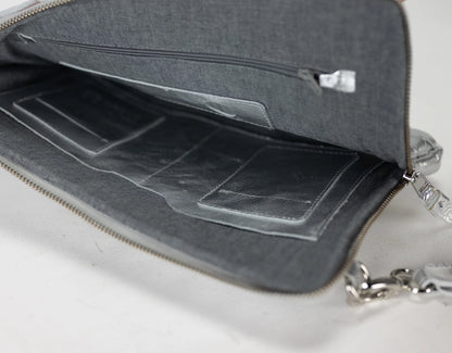 Gray bag with a compartmentalized interior on a white background