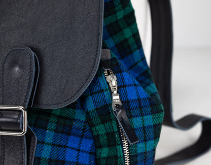Close-up of a plaid bag with a zipper on a white background