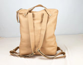 Beige backpack on a white background