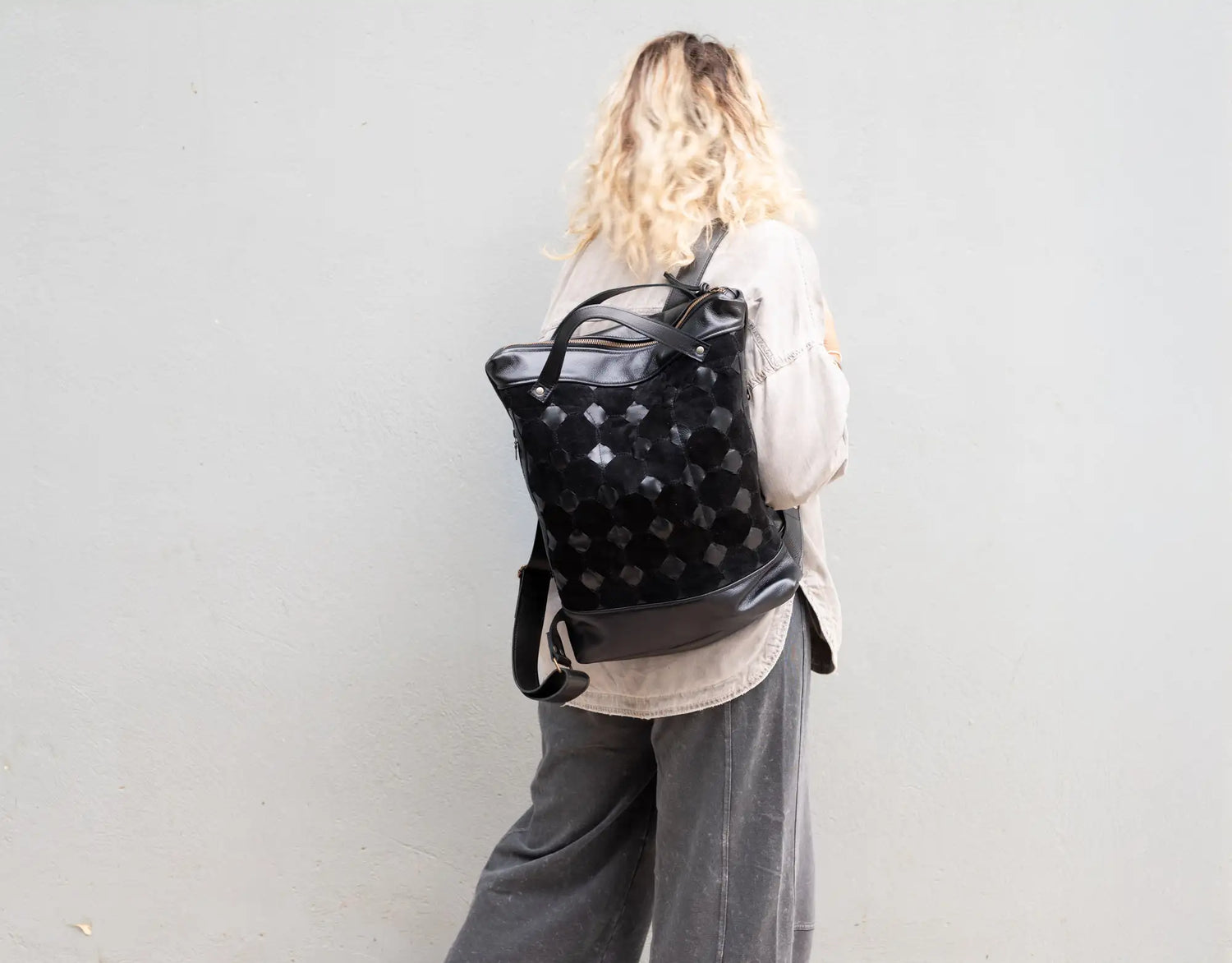 black leather woven backpack Minos Backpack