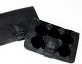 Black leather case with a strap on a white background