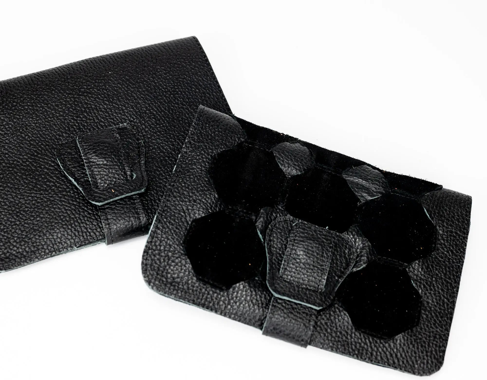 Black leather case with a strap on a white background