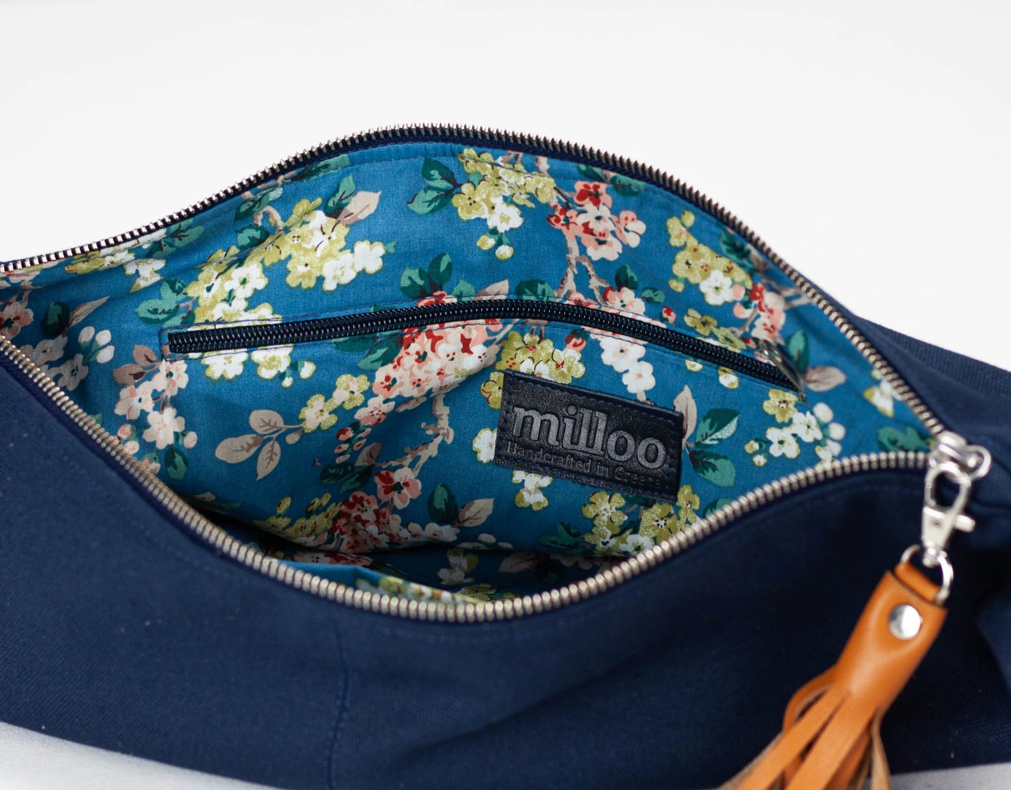 Navy blue bag with floral lining and &