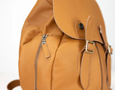 Brown leather backpack with zippers