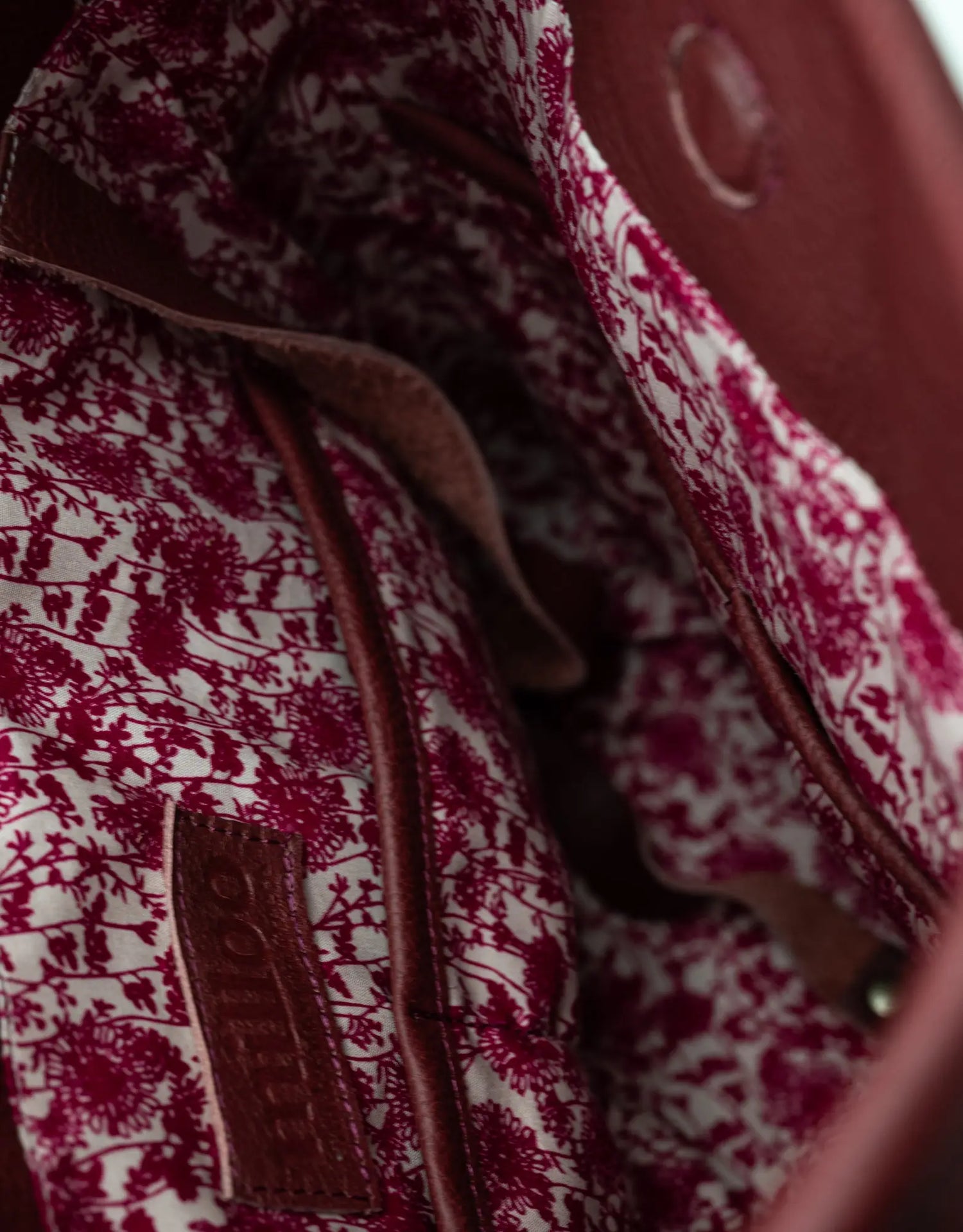 burgundy leather textured bag