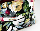 Floral-patterned clutch bag on a white background