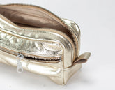 Gold metallic pouch with zipper on a white background