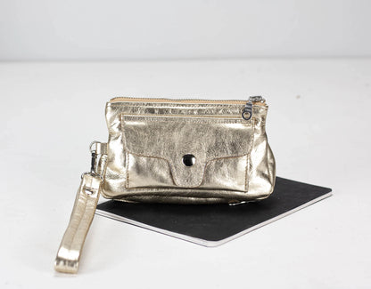 Yellow Gold metallic clutch bag on a white background