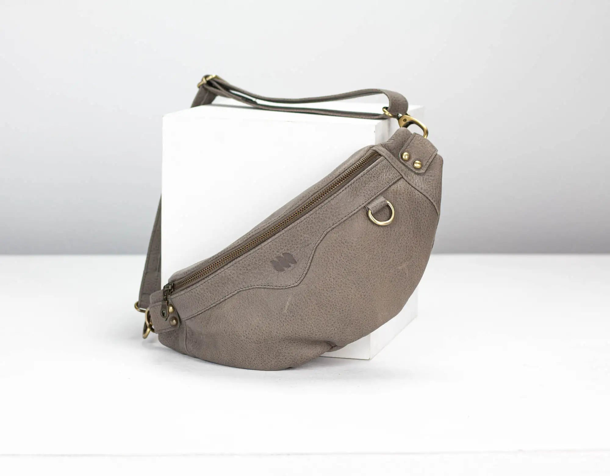 Grey handbag on a white background