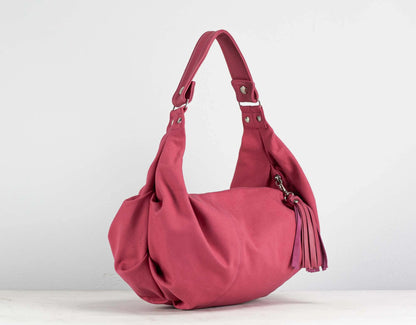 Pink handbag on a white background