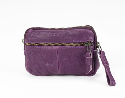 Purple leather pouch with a zipper on a white background