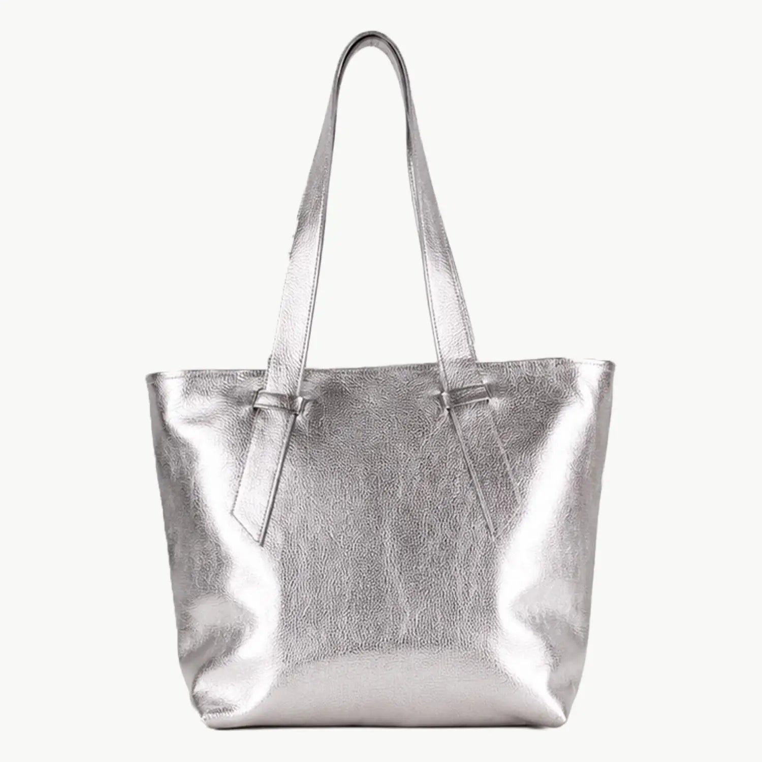 A metallic silver tote bag with two shoulder straps, shown against a plain off-white background.
