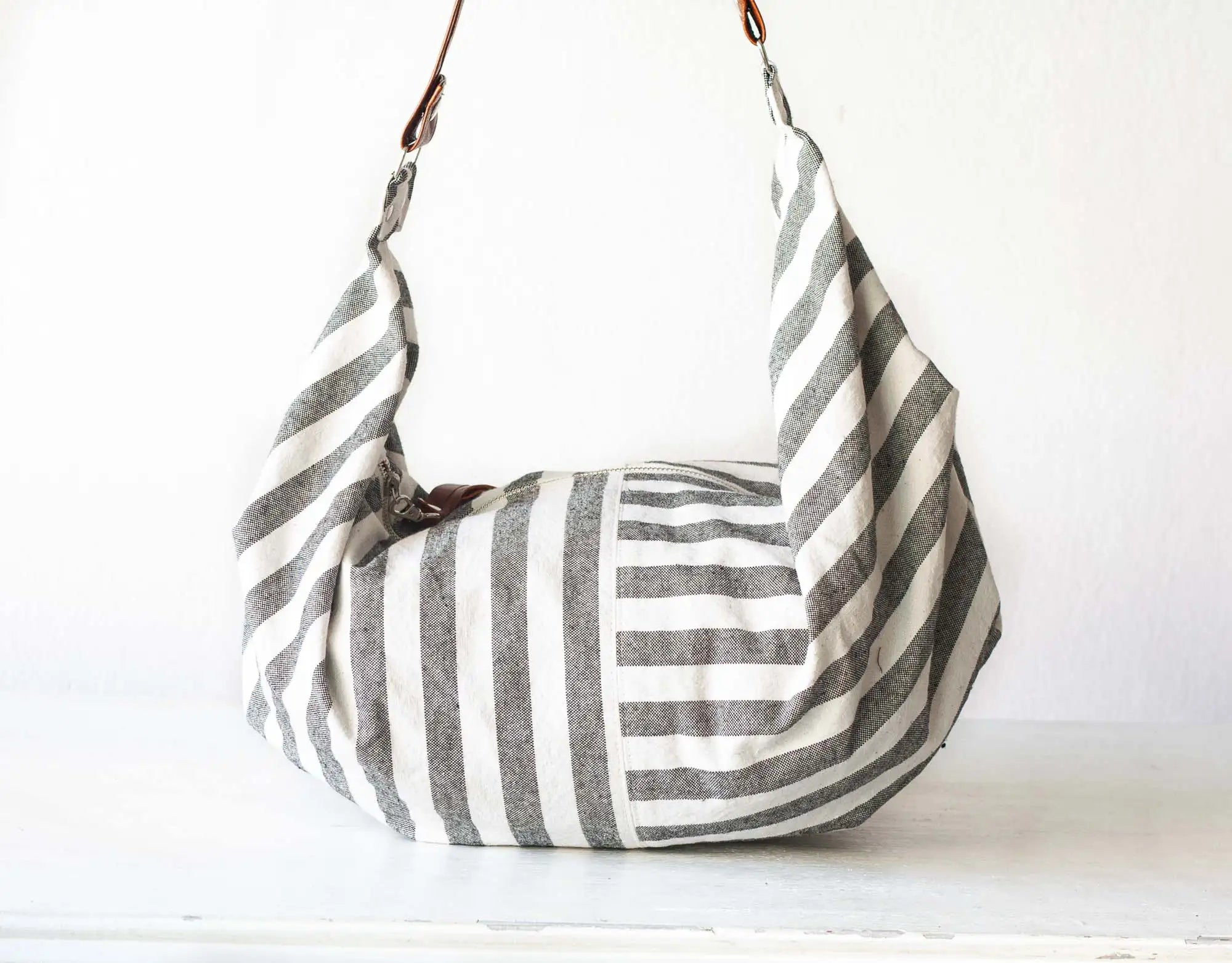Striped handbag with a white background